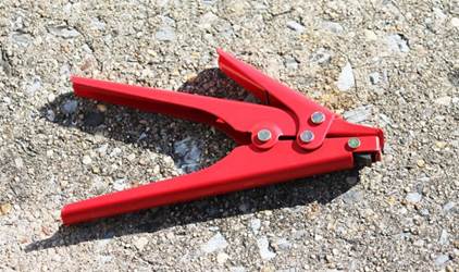 Cutter and puller tool for poly fence ties Cutter and puller tool for poly fence ties